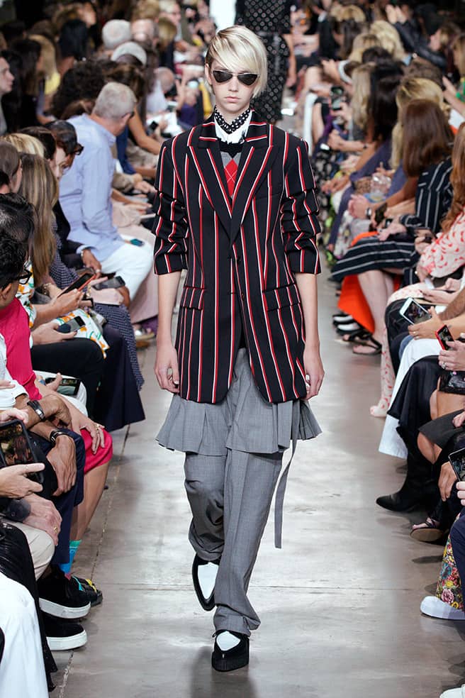 LOOK 48 - BLACK/CRIMSON VARSITY STRIPE WOOL PUSH-UP SLEEVE BOYFRIEND BLAZER, BLACK/CRIMSON PATCHWORK ARGYLE CASHMERE FRAYED PULLOVER, WHITE POPLIN DICKEY, BANKER STRETCH TROPICAL WOOL KILT TROUSER