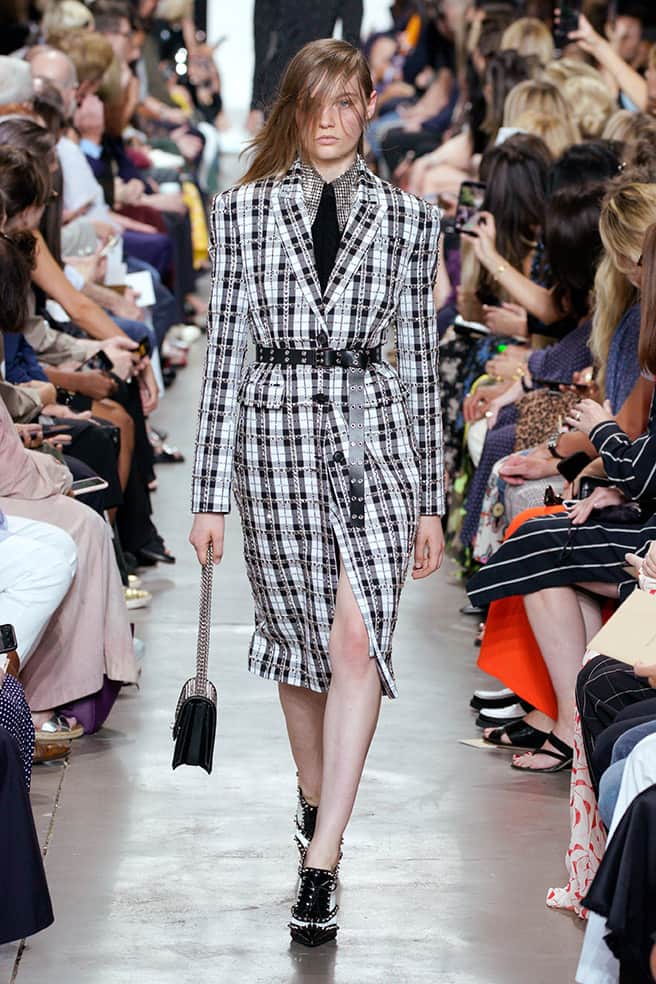 LOOK 67 - BLACK/WHITE TARTAN COTTON/WOOL COAT WITH SILVER STUD/CRYSTAL EMBROIDERY, BLACK CABLE CASHMERE VEST, BLACK STUDDED POPLIN DICKEY, BLACK/WHITE TARTAN COTTON/WOOL SLIT PENCIL SKIRT, MONOGRAMME CHAIN BAG